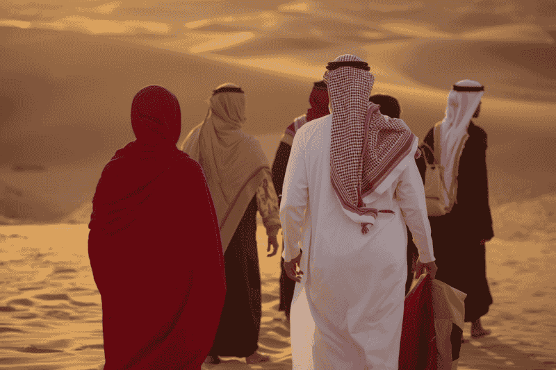 Guests exploring the beautiful desert landscape during an Abu Dhabi desert safari